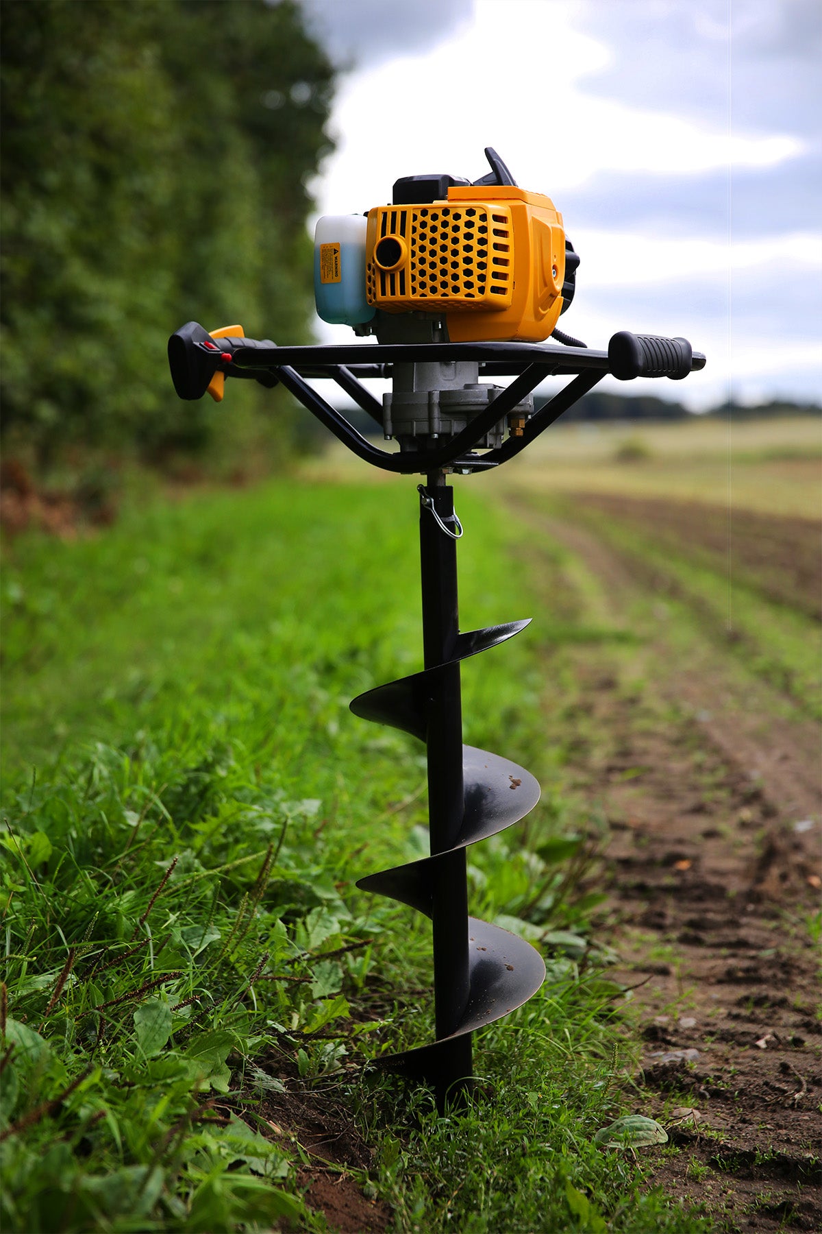 Trado a gasolina EA5300 com brocas